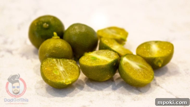 Easy Instant Pot Bulalo 4 Whole and cut Calamansi or Philippine limes on a counter.