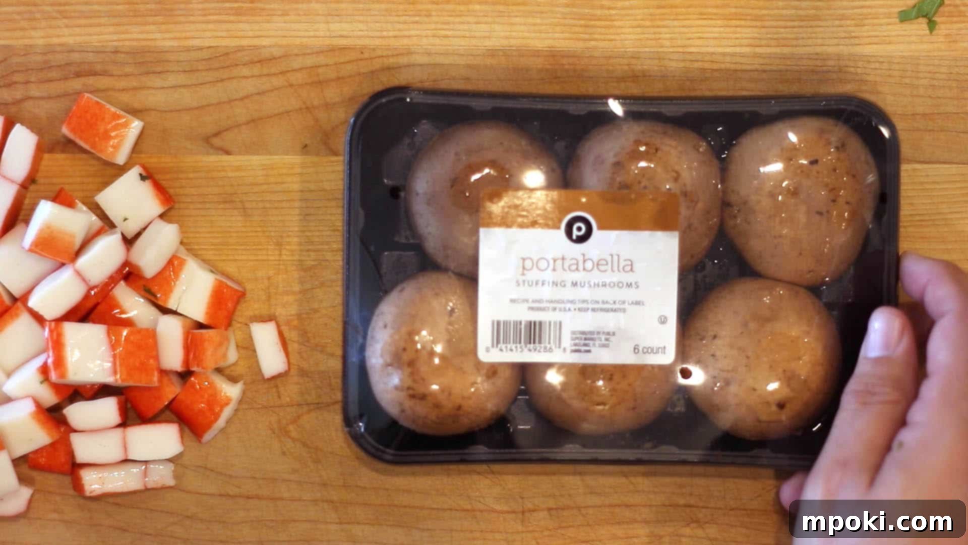 Crab-Stuffed Mushrooms: Air Fryer and Oven Delights 13 a package of portabella mushrooms on a cutting board next to cut up crab