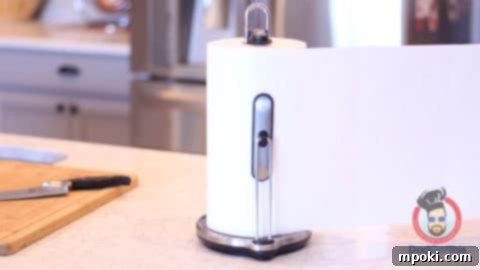 Anchor Your Cutting Board for a Steady Slice 3 paper towels being pulled off a roll