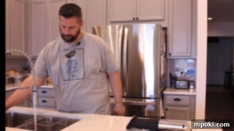 Sous Vide Simplified Your Essential Guide 7 filling a container for sous vide