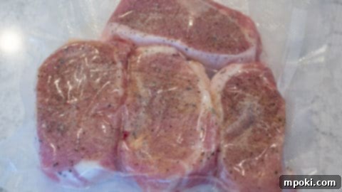 Sous Vide Simplified Your Essential Guide 10 Pork chops sealed in a vacuum bag