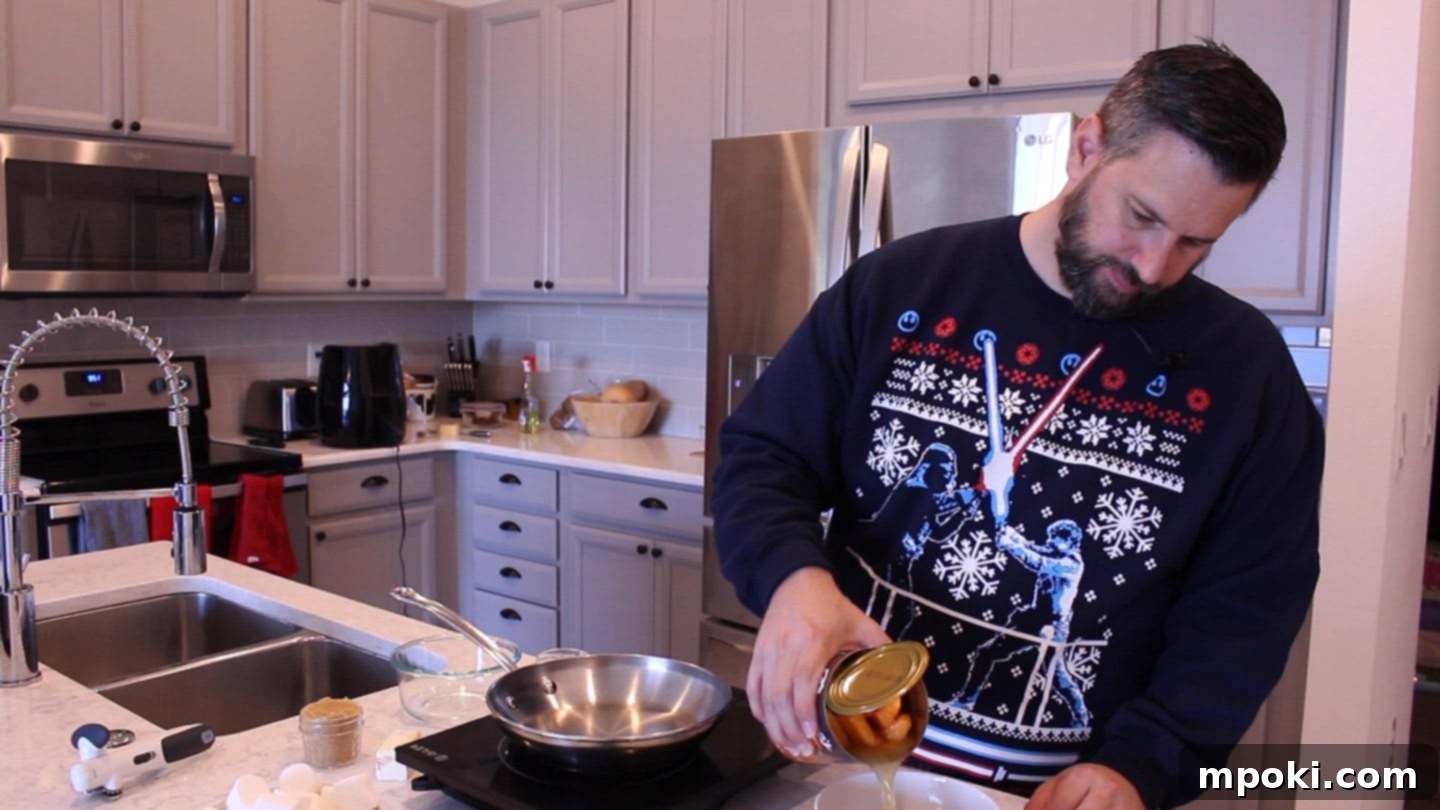 Air Fryer Candied Yams and Toasted Marshmallows 3 Draining canned yams (sweet potatoes) to prepare for making candied yams