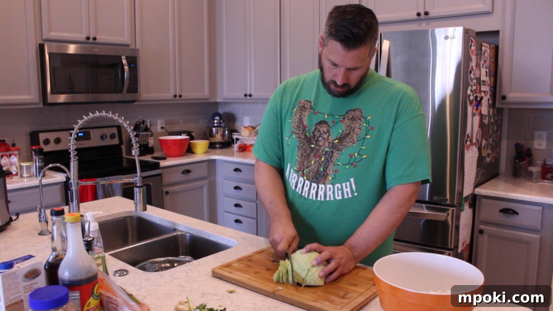 One-Pot Instant Pot Pancit Bihon 3 cabbage being cut on a cutting board