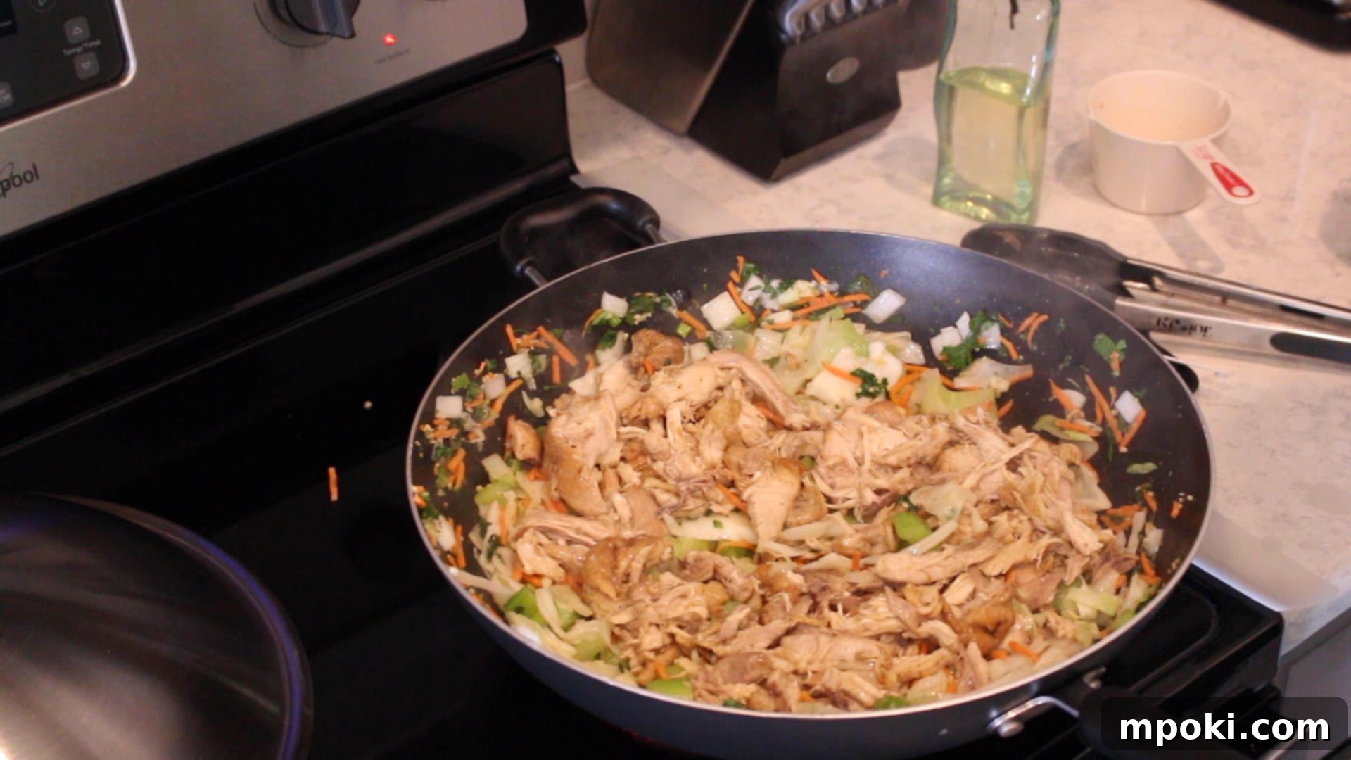 One-Pot Instant Pot Pancit Bihon 10 pancit bihon in a wok