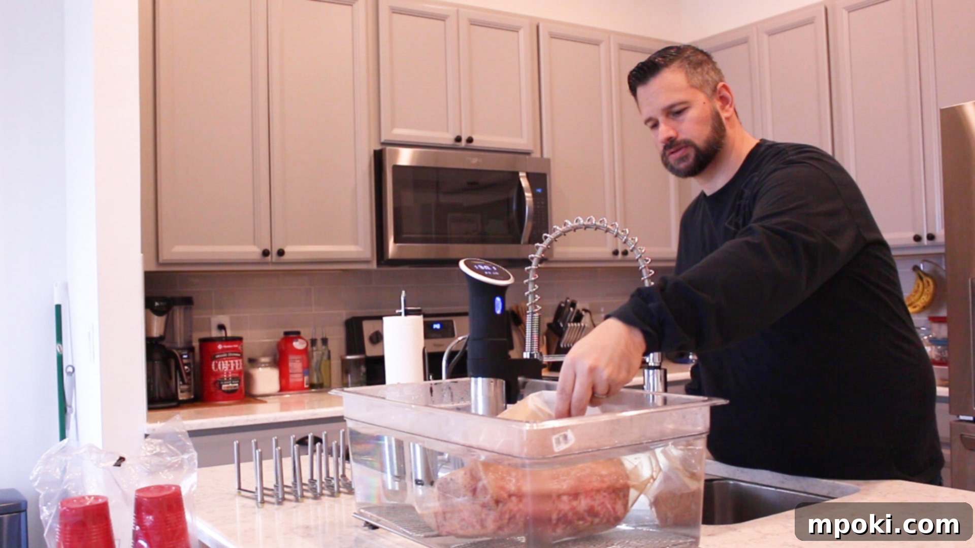 Perfect Sous Vide Prime Rib 6 Placing a sealed prime rib roast into the sous vide water bath