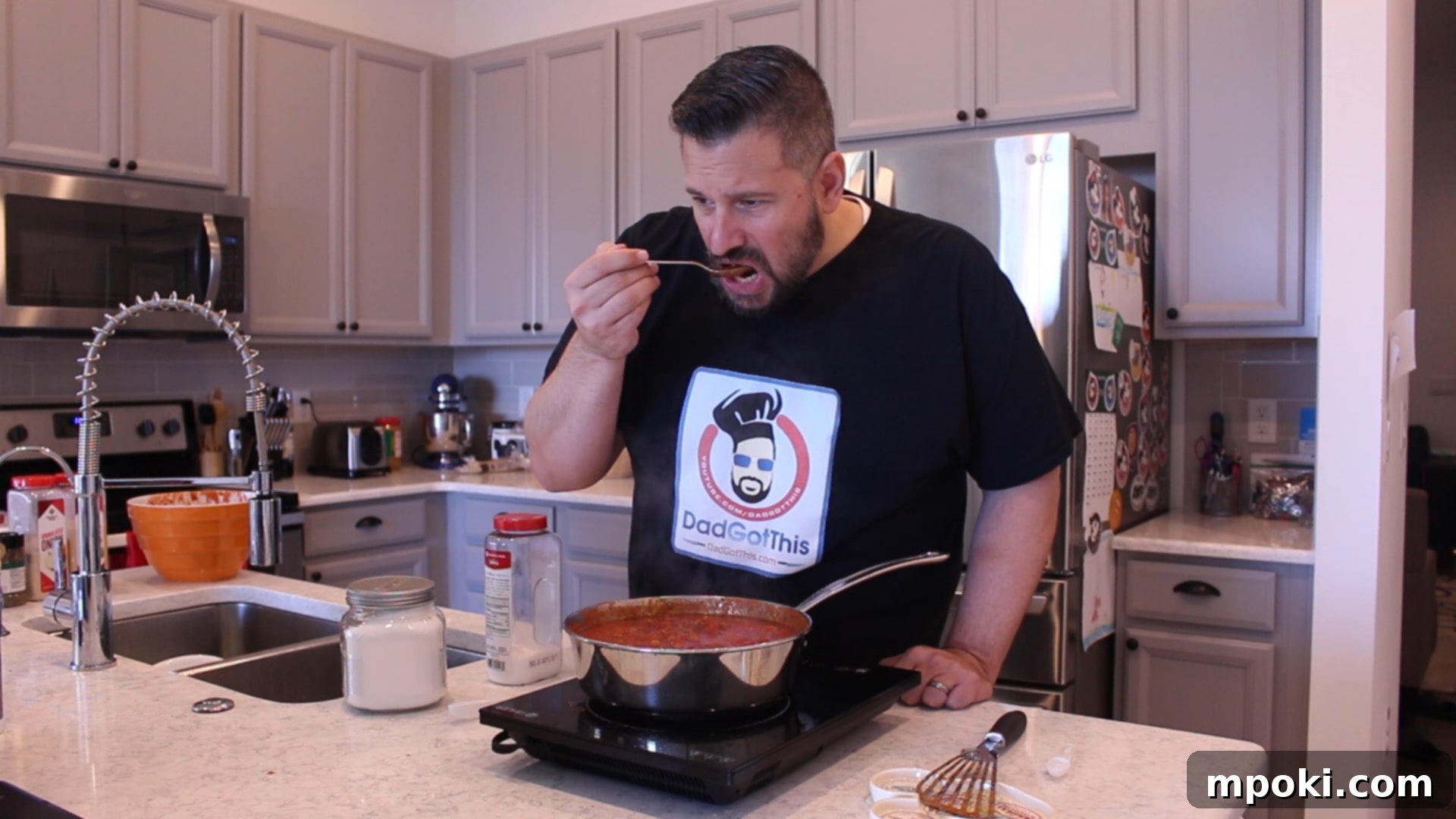 Effortless Homemade Meat Sauce 8 Crushed tomatoes added to browned meat and aromatics in a pan