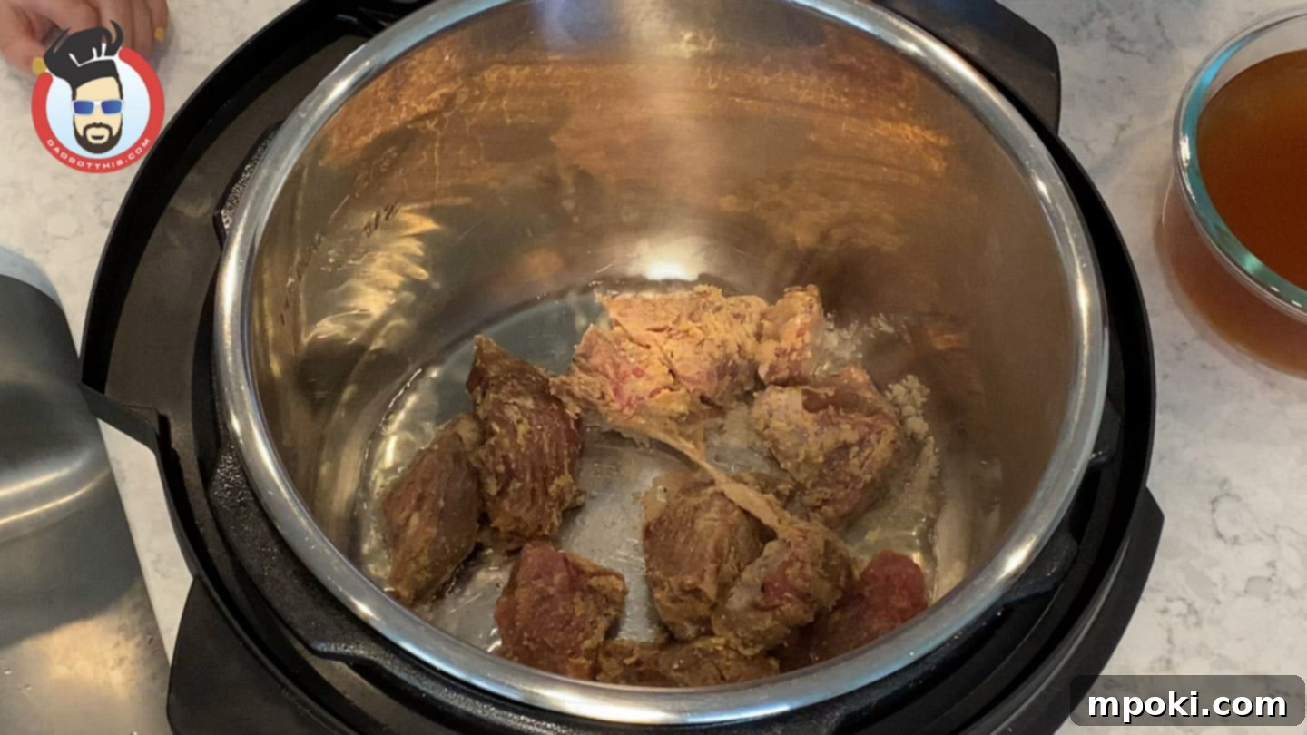 Quick and Creamy Instant Pot Beef Stroganoff 4 Sautéing seasoned beef in the Instant Pot for Beef Stroganoff until evenly browned.