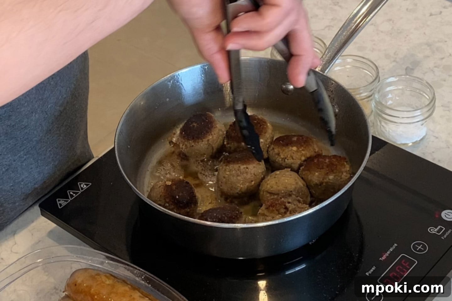 Grandma's Secret Sunday Sauce 5 frying the meatballs