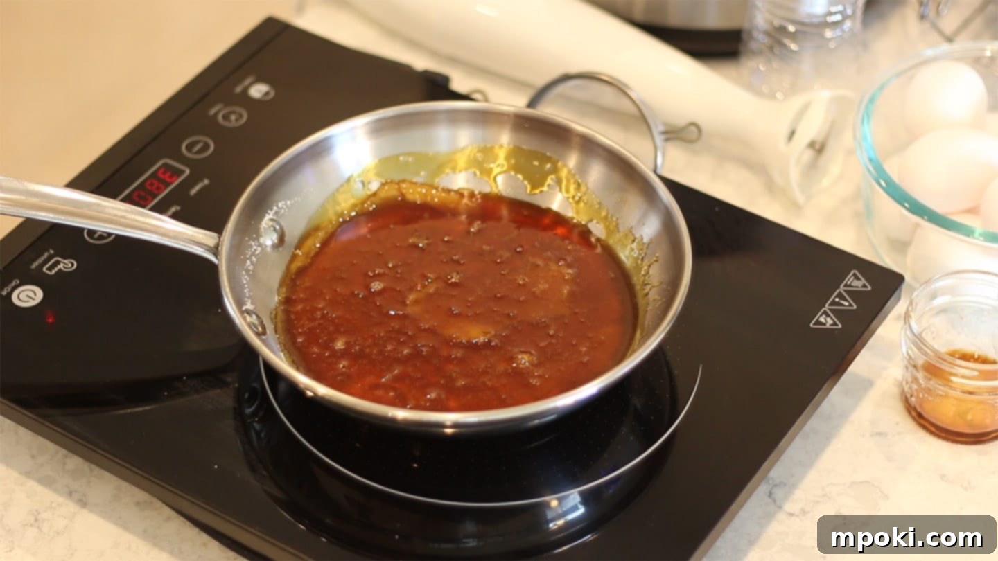 Authentic Leche Flan Quick Instant Pot Recipe 3 Close-up of perfectly amber-colored caramel sauce glistening in a pan, a key step for delicious Leche Flan.
