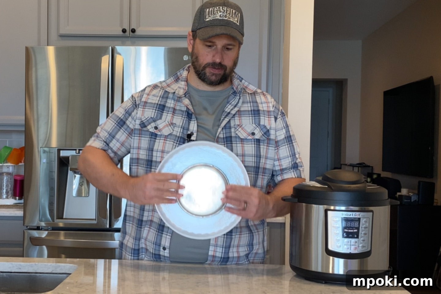 Authentic Leche Flan Quick Instant Pot Recipe 8 The exciting moment of flipping a perfectly cooked Leche Flan from its baking pan onto a serving plate, revealing the golden caramel.