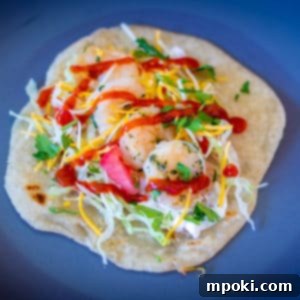 Your Go-To 30 Minute Shrimp Taco Dinner 6 Delicious shrimp tacos plated and ready to eat