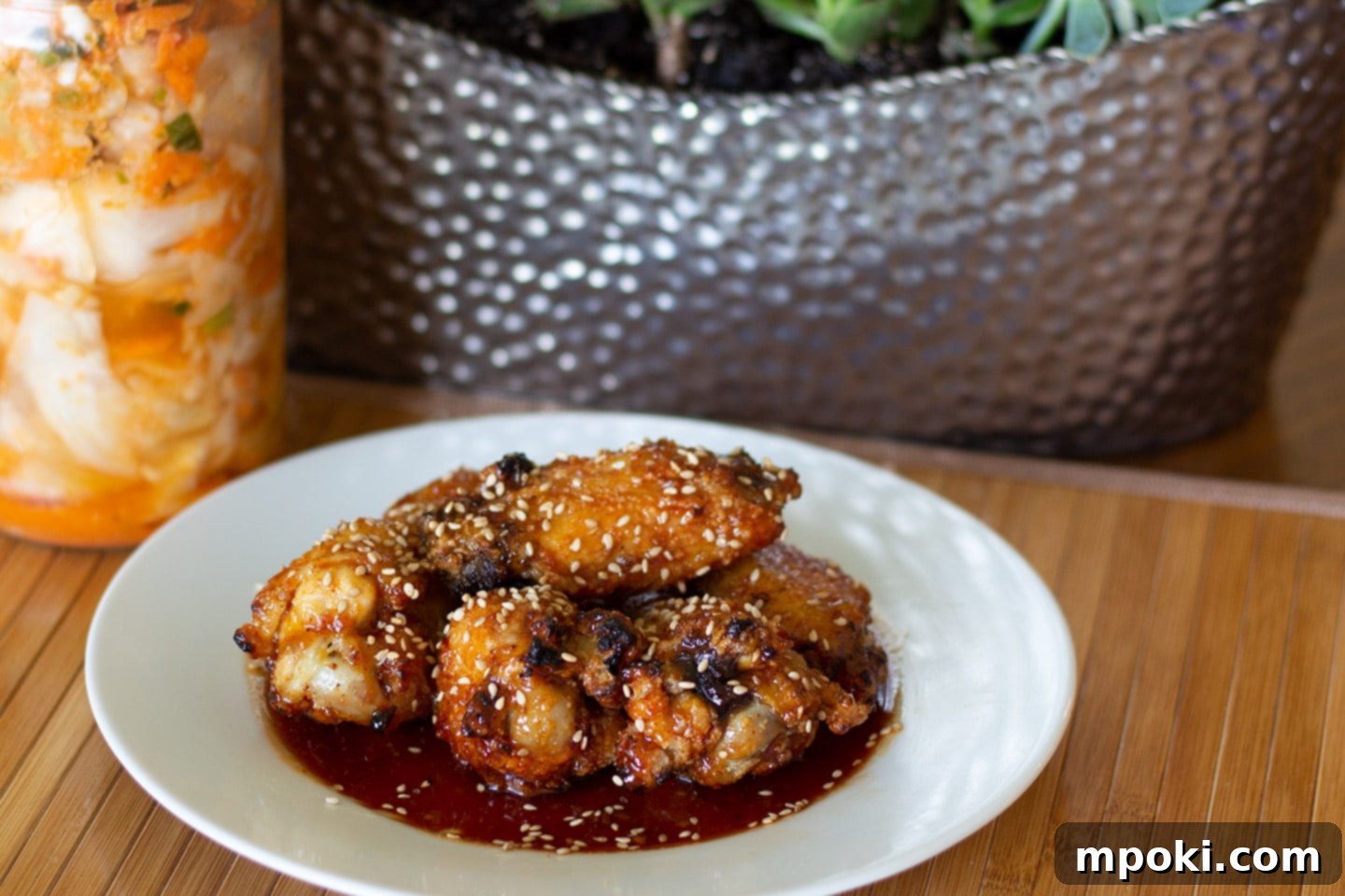 Air-Fried Korean Crispy Wings 2 air fried korean fried chicken wings on a plate