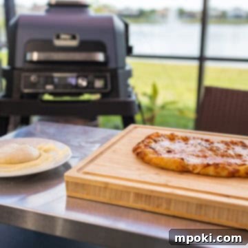 Unleash Woodfired Pizza Magic with Ninja Woodfire XL 3 Pizza on the Ninja Woodfire XL Pro Connect