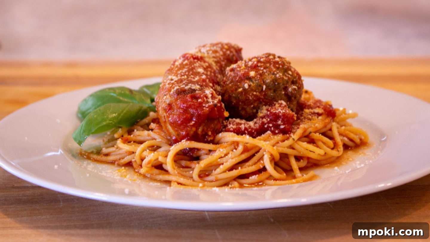 Unleash Woodfired Pizza Magic with Ninja Woodfire XL 5 italian sunday sauce over pasta top