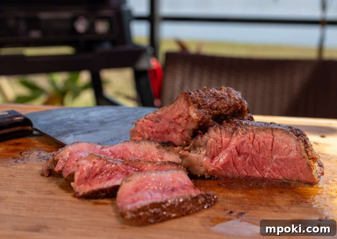 Ultimate Woodfired Chuck Steak on Your Ninja Grill 2 Smoked Chuck Steak on a cutting board