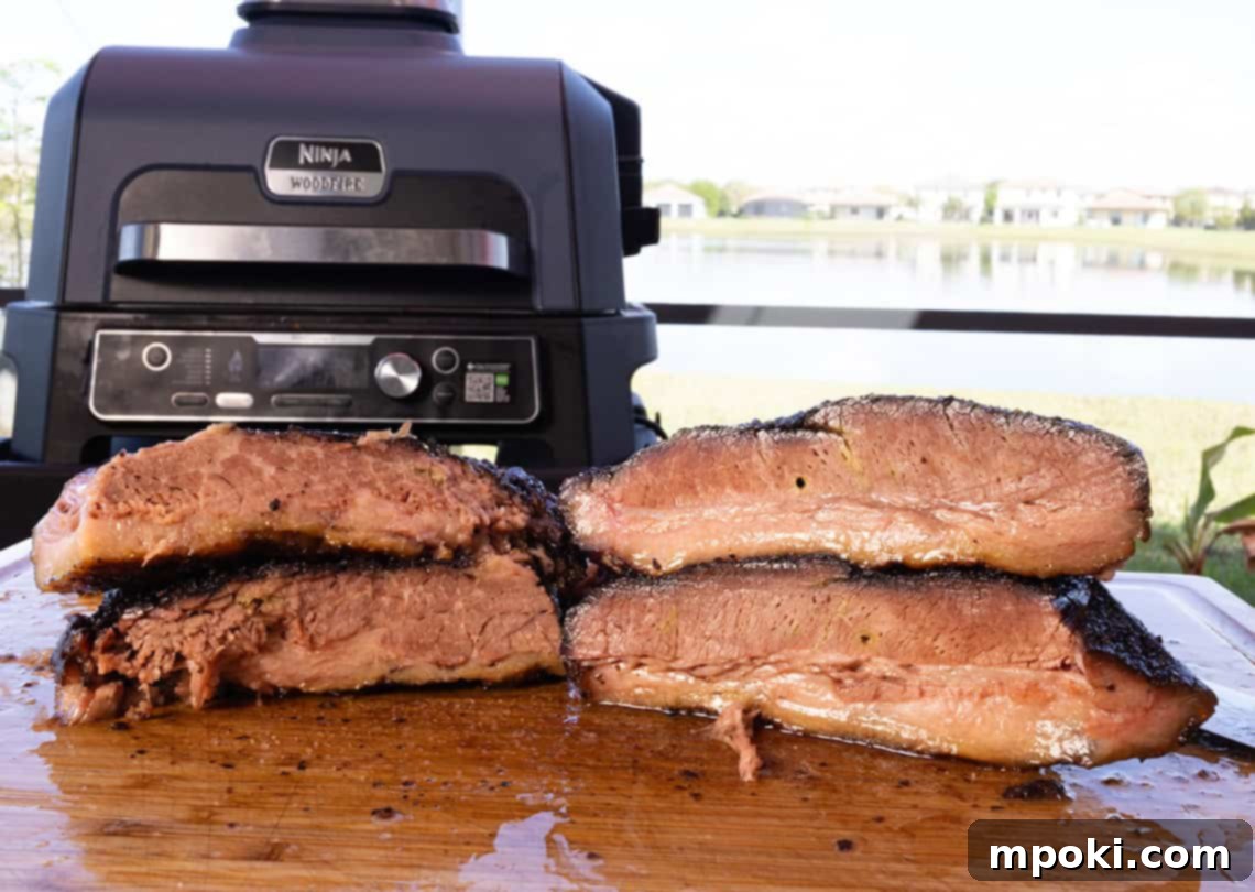 Smoked Brisket Perfection: Ninja Woodfire Style 2 brisket cooked on a ninja woodfire grill