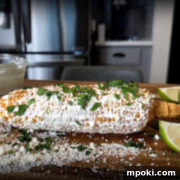 Smoky Ninja Woodfire Elote 3 Mexican Street Corn cooked on the Ninja Woodfire Grill.