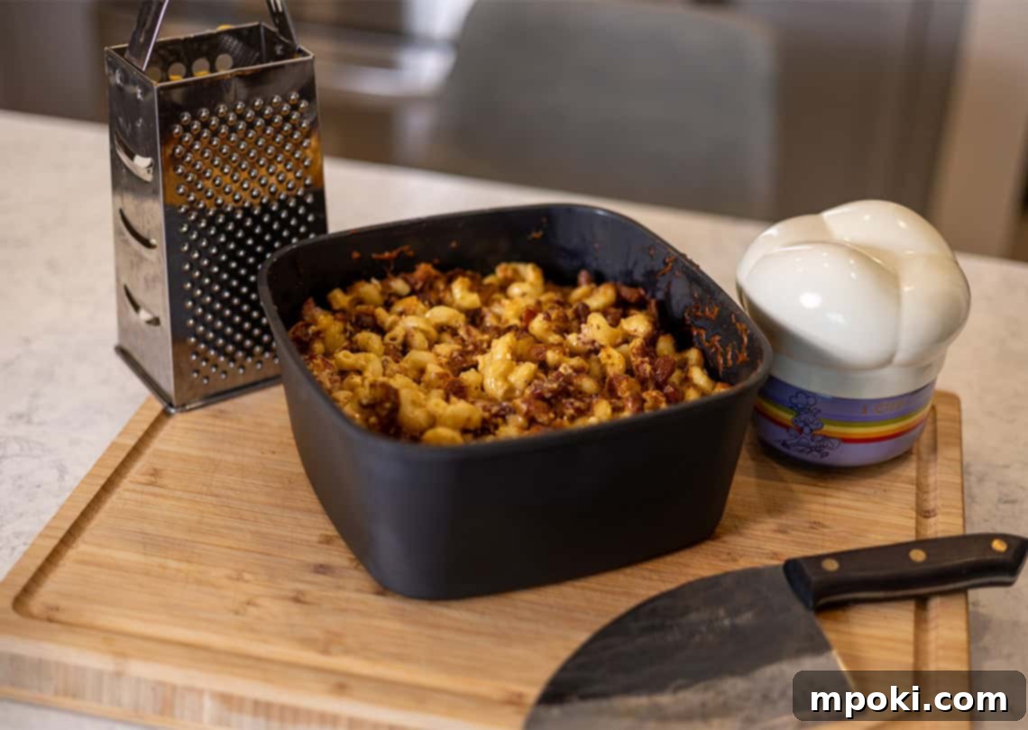 Ultimate Ninja Woodfire Smoked Bacon Mac and Cheese 2 Smoked Bacon Mac and Cheese, a rich and creamy dish with crispy smoked bacon bits, perfect for comfort food lovers.