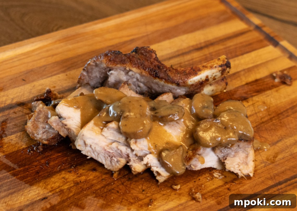 Pan-Seared Double Pork Chop with Velvety Mushroom Gravy 2 double cut pork chop with mushroom gravy cooked in an air fryer
