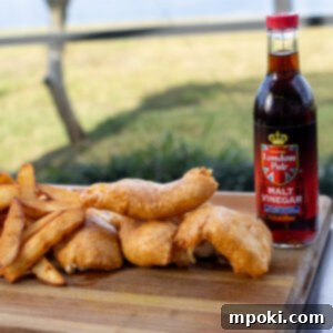 Close-up of Crispy Fish and Golden Chips